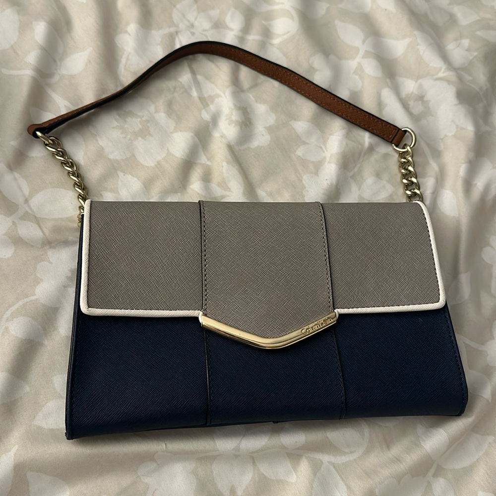 Calvin Klein leather clutch gold strap